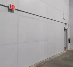 Green LED Exit Sign With Battery Backup - Single Or Double Face -Lighting Decoration Store xs x installed in warehouse